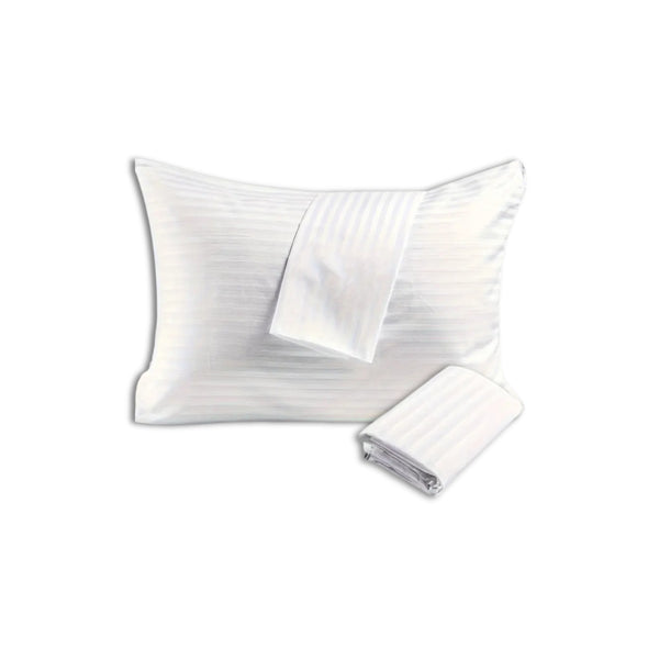White pillow with matching striped cotton pillowcases, one folded and one draped, showcasing elegant hotel-style bedding.