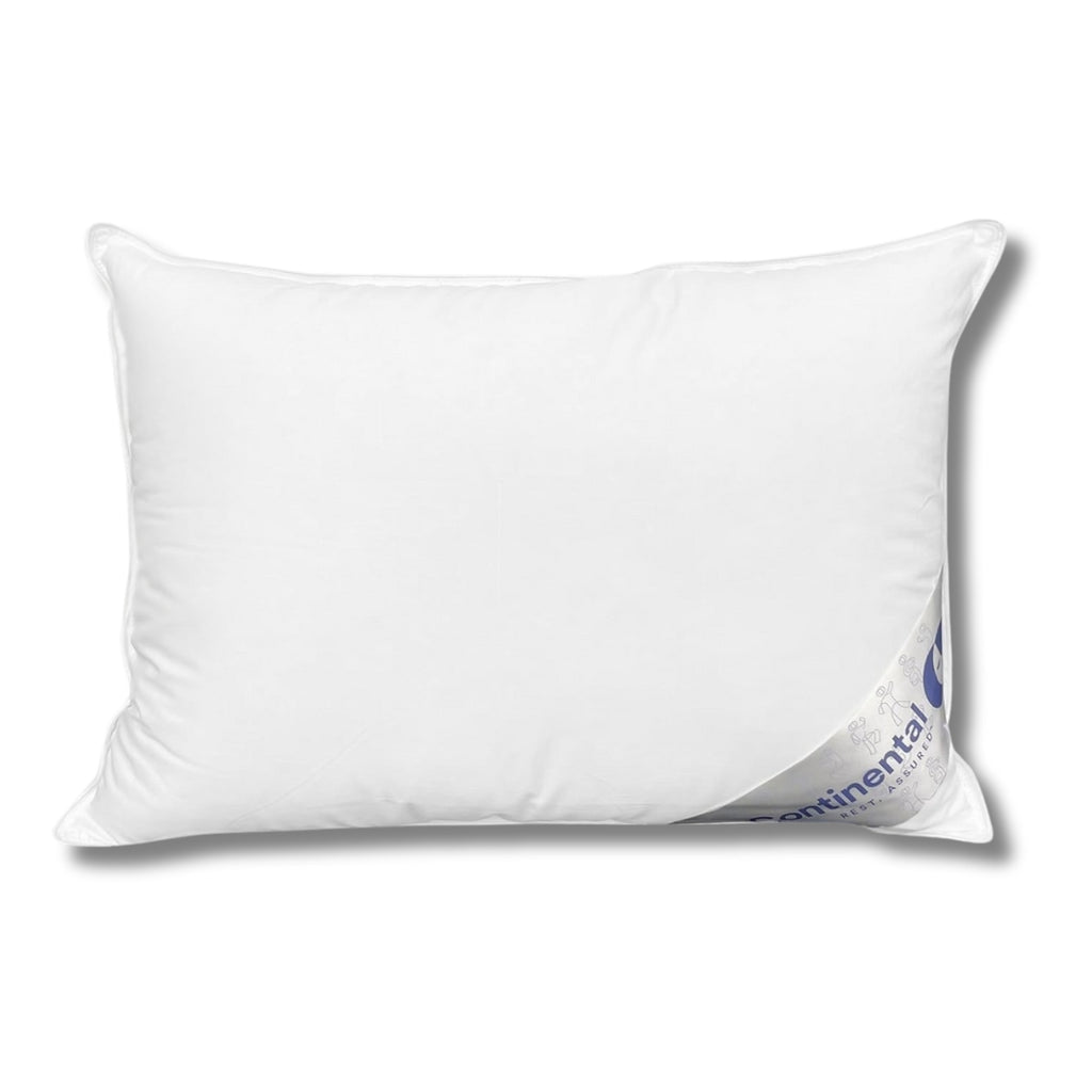 White Continental toddler pillow shown on a white background with branded tag peeking from the corner.

