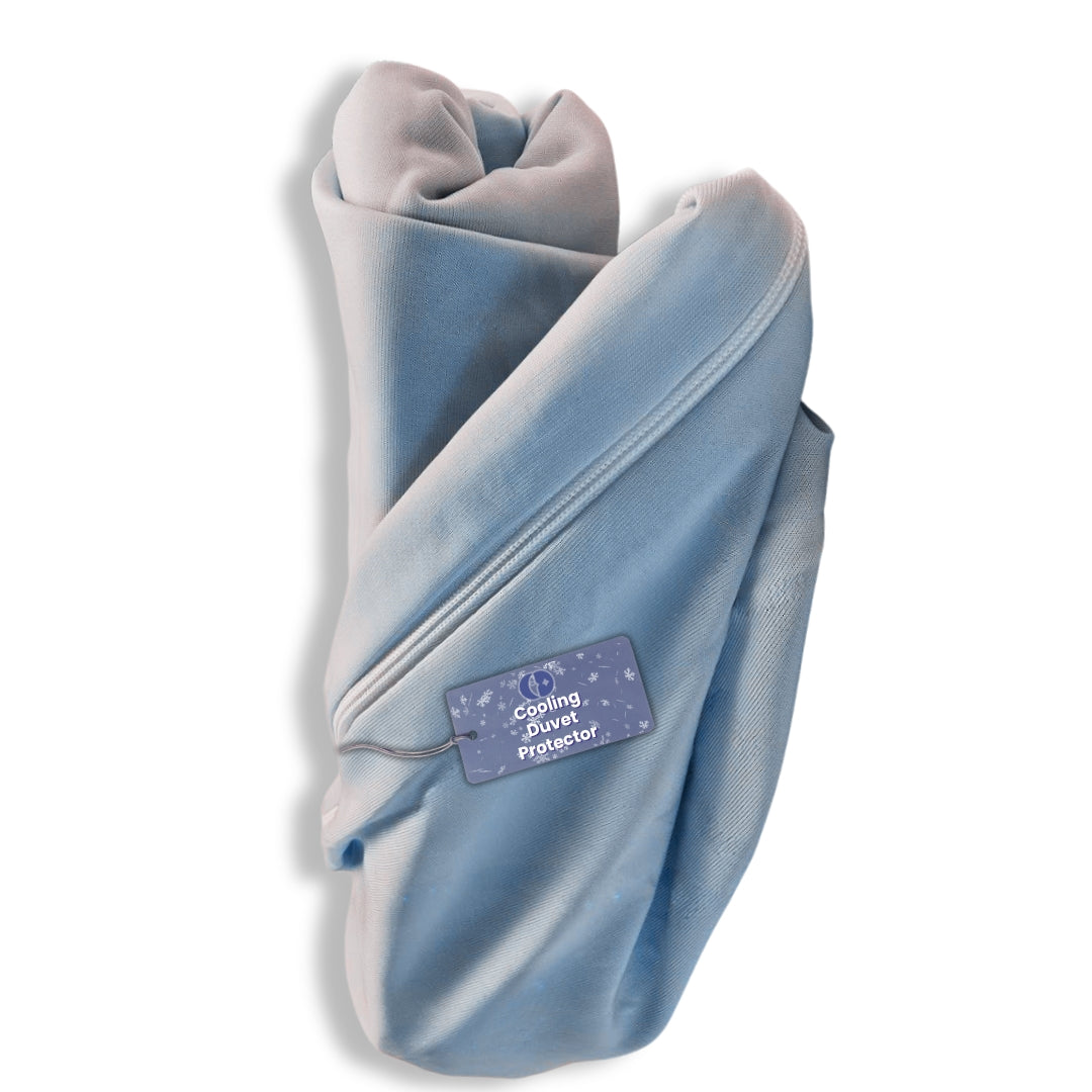 Light blue duvet protector from Continental Bedding, elegantly twisted and displaying a label that reads 'Cooling Duvet Protector', emphasizing its specialized cooling properties.