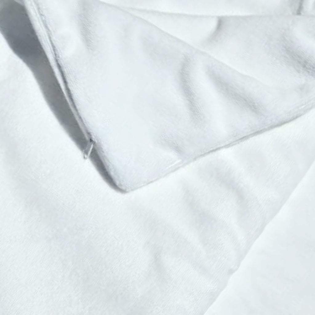 Close-up view of the zipper on the fleece pillow protector, highlighting the secure closure and fine stitching