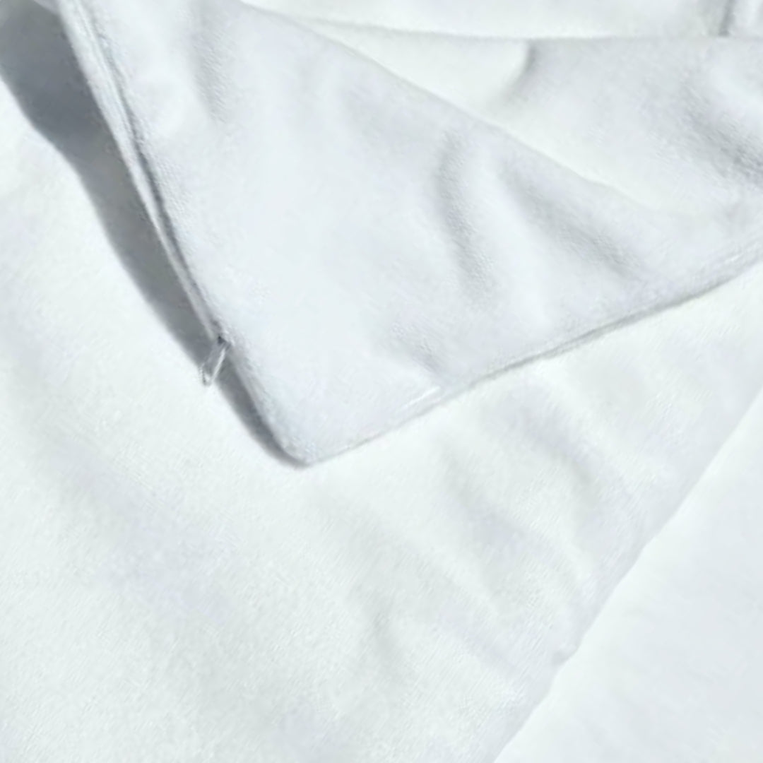 Close-up view of the zipper on the fleece pillow protector, highlighting the secure closure and fine stitching